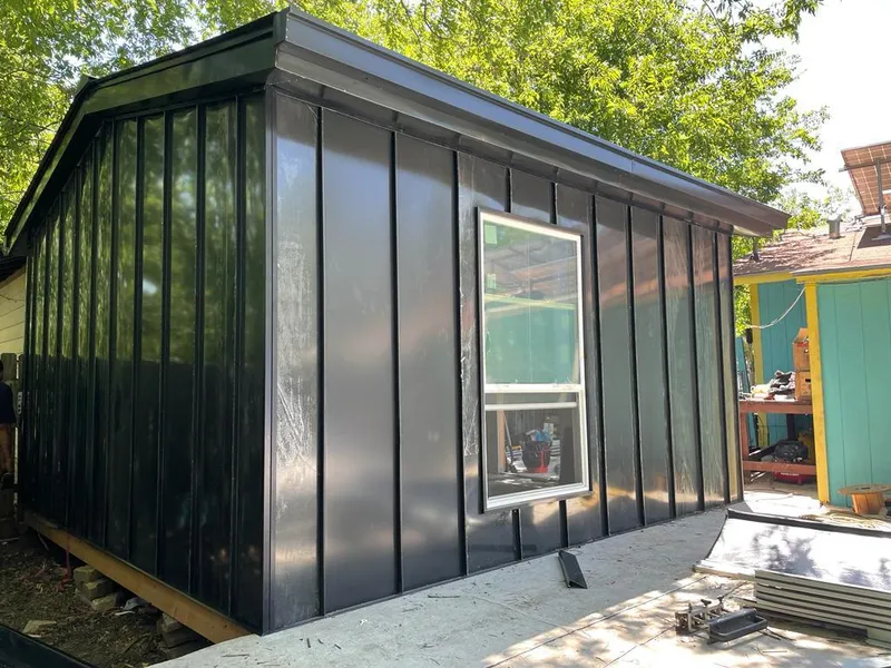 Black standing seam metal wall panels for Metal Roof Installation in La Porte