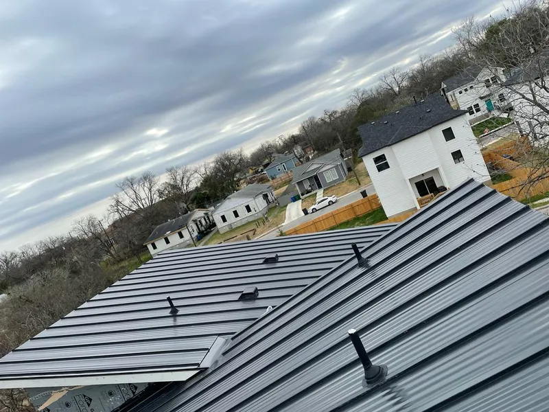 Standing seam metal roof panels with vents for Skylight Repair in La Porte